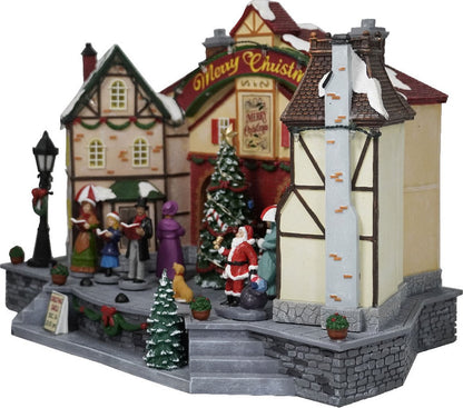 Kristmar Christmas village with rotating Christmas tree and illuminated houses