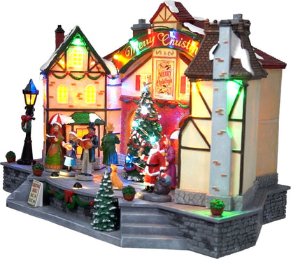 Kristmar Christmas village with rotating Christmas tree and illuminated houses